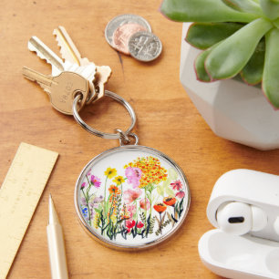 Lebhafter Garten mit Wildblume Schlüsselanhänger