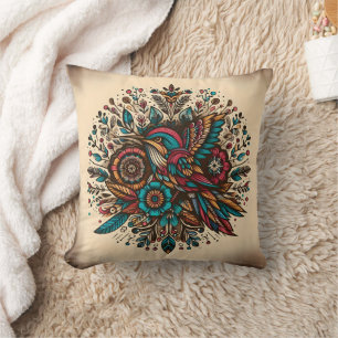 Lebhafter Kolibri unter floralen Designs in der Ab Kissen