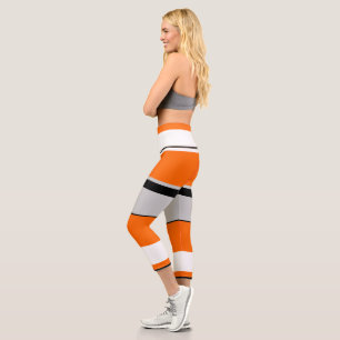 Lebhafter Orange-, Weiß-, Schwarz- und Asche-Stre Capri Leggings