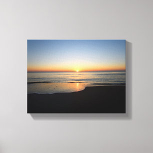 Lebhafter Sonnenaufgang über dem Meer Leinwanddruck