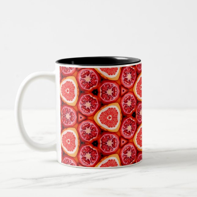 Lebhaftes Pomegranat- und Grapefruitmuster Zweifarbige Tasse (Links)