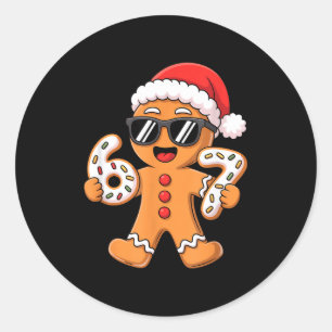 Lebkuchen-Weihnachtsmann mit Sonnenbrille hält 67  Runder Aufkleber