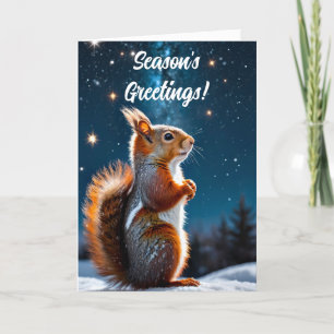 L'écureuil rouge dans la carte de Noël des Fêtes d