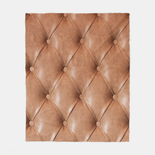 Ledersofa-Hintergrund Fleecedecke