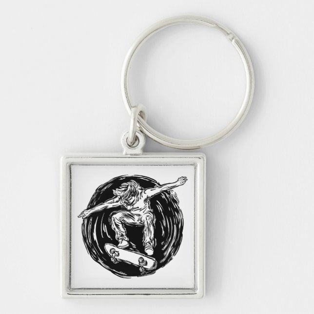 Legendärer Skater beim Skateboarden im Mittelluftb Schlüsselanhänger (Vorne)