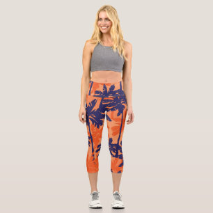 Leggings Capri Silhouette de palmier bleu, arrière - plan orange