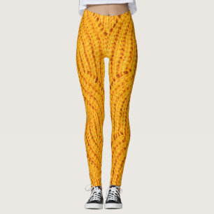Leggings Chandail en tricot orange, arrière - plan texturé.