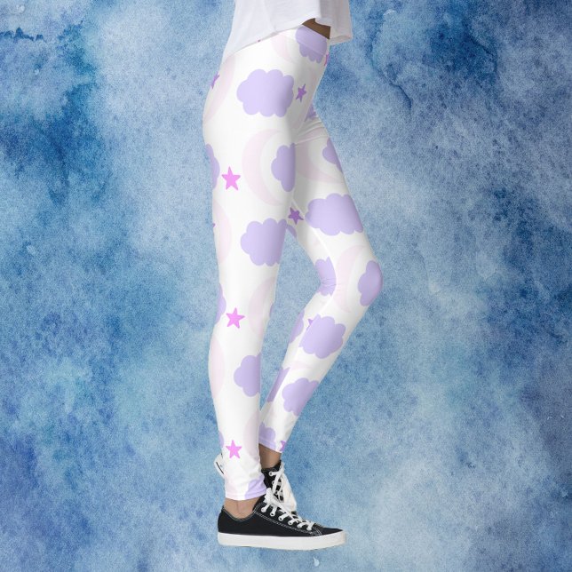 Leggings Crescent Moon Clouds Stars Pattern Pink Purple (A pair of leggings with clouds, moons and stars done in pink and purple)