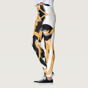 Leggings Gravures ou bandes orange et noir détruites