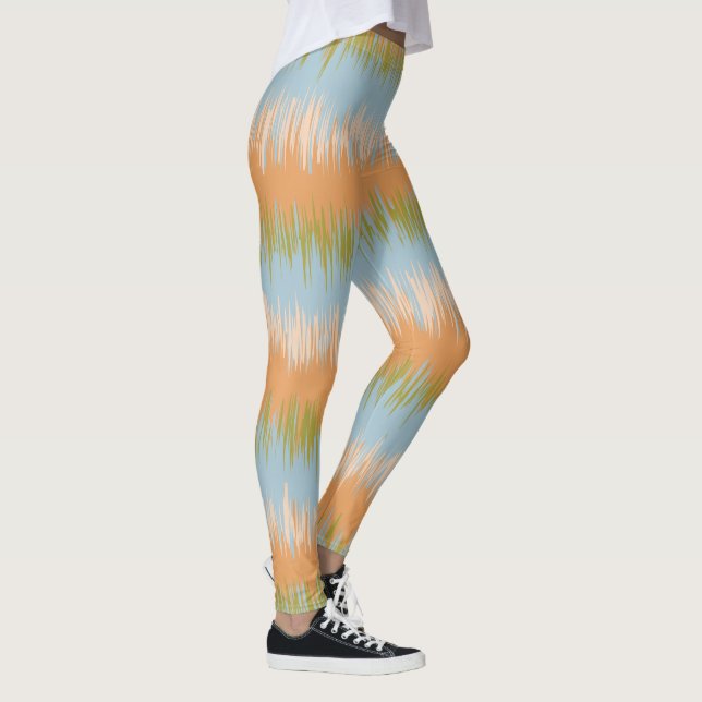 Leggings Guêtres oranges de rayure d'abrégé sur ressort (Droite)