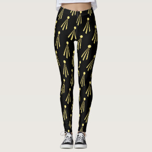 Leggings Motif de rayons de soleil jaunes sur fond noir