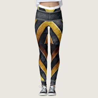 Leggings motif géométrique noir et or