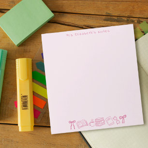 Lehrerbücher mit rosa Doodles Notizblock