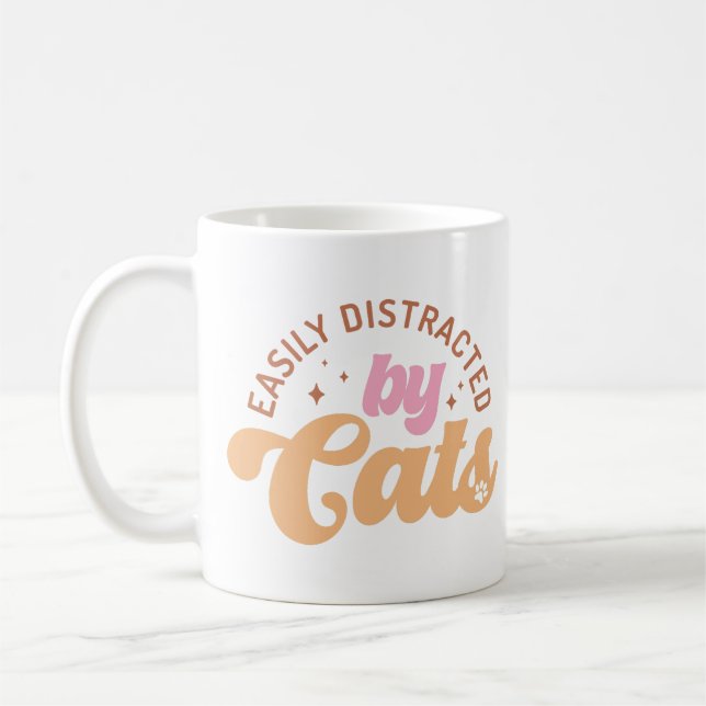 Leicht von Katzen abgelenkt Kaffeetasse (Links)