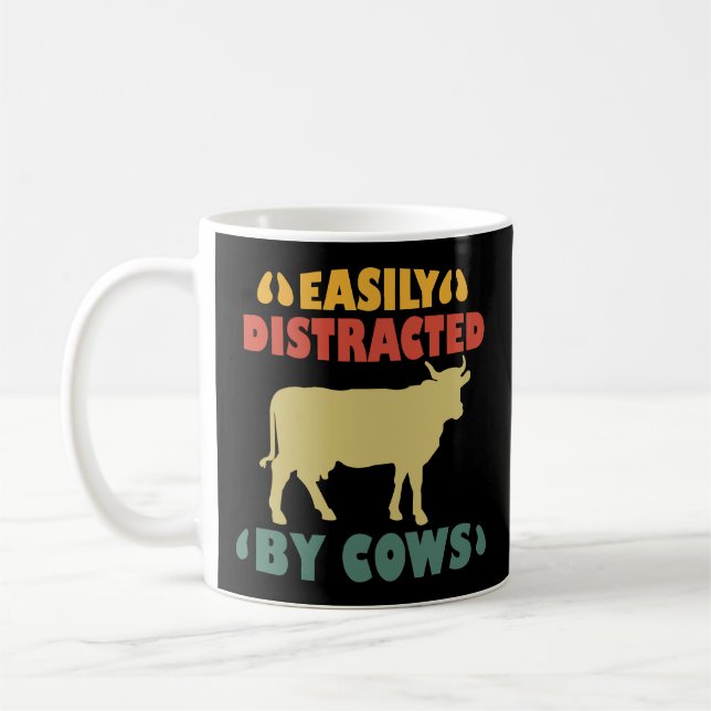 Leicht von Kühen abgelenkt Kaffeetasse (Links)