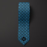 Leichte blaue und schwarze Arabeske-Monogramm Krawatte<br><div class="desc">Leichte,  blaue und schwarz-arabbeske Monogramm-Krawatte für die Personalisierung. Einzigartiges,  elegantes Design,  ideal für Geschäftsleute,  Vatertagsgeschenke oder andere besondere Anlässe für die Männer in Ihrem Leben. Stellen Sie sicher,  dass Sie die passenden Socken mit dem gleichen Design aus dem Karo ziehen.</div>