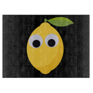 Lemon, sweet fruit with googly eyes schneidebrett