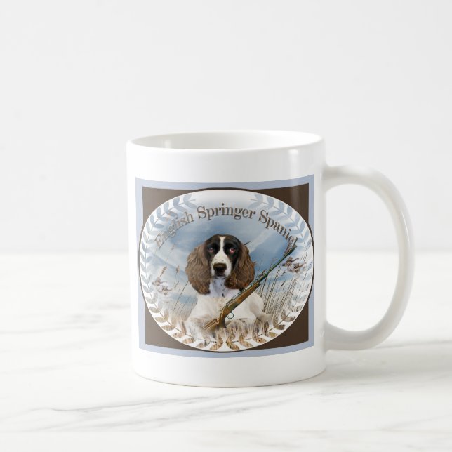 L'épagneul de springer anglais chasse la tasse (Droite)