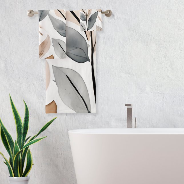 Les botaniques de la nature (Nature's Botanicals is a pretty towel set featuring shades of gray and beige on a white background.)