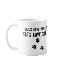 Les chiens ont des chats de maîtres avoir la tasse