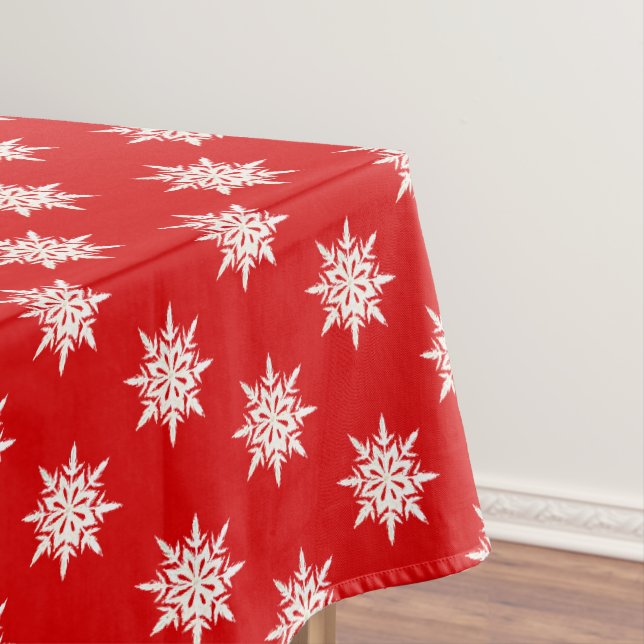 Les flocons de neige de Noël sur la nappe rouge (In Situ)