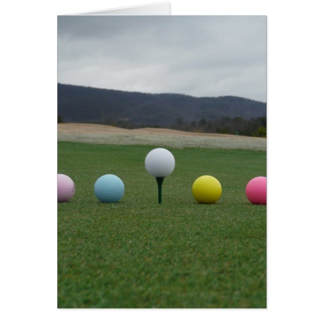 leuchtend farbige Golfbälle auf einem Berg (Vorne)