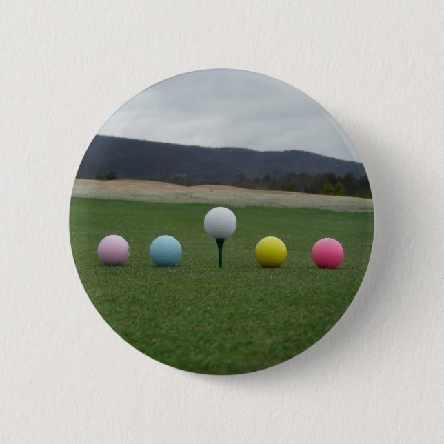 leuchtend farbige Golfbälle auf einem Berg Button (Vorderseite)