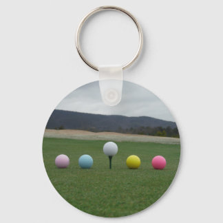 leuchtend farbige Golfbälle auf einem Berg Schlüsselanhänger