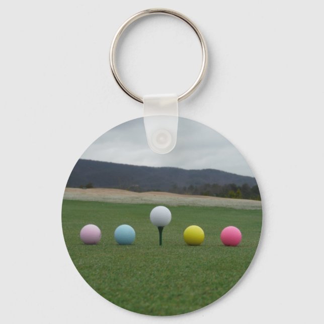 leuchtend farbige Golfbälle auf einem Berg Schlüsselanhänger (Vorderseite)
