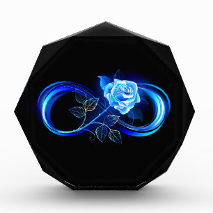 Leuchtende Unendlichkeit mit blauer Rose Fotoblock