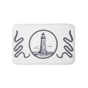Leuchtturm am Meer in Rundseilrahmen Badematte