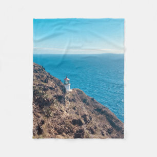Leuchtturm auf dem blauen Felsen Hawaii Fleecedecke