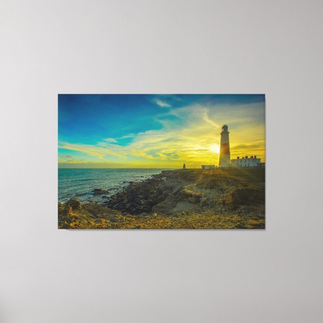 Leuchtturm bei Sonnenuntergang Leinwanddruck (Vorderseite)