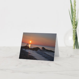 Lever de soleil sur le carte pour notes de blanc
