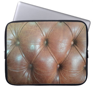 Licht auf brauner Ledersofa-Oberfläche, Textur abs Laptopschutzhülle