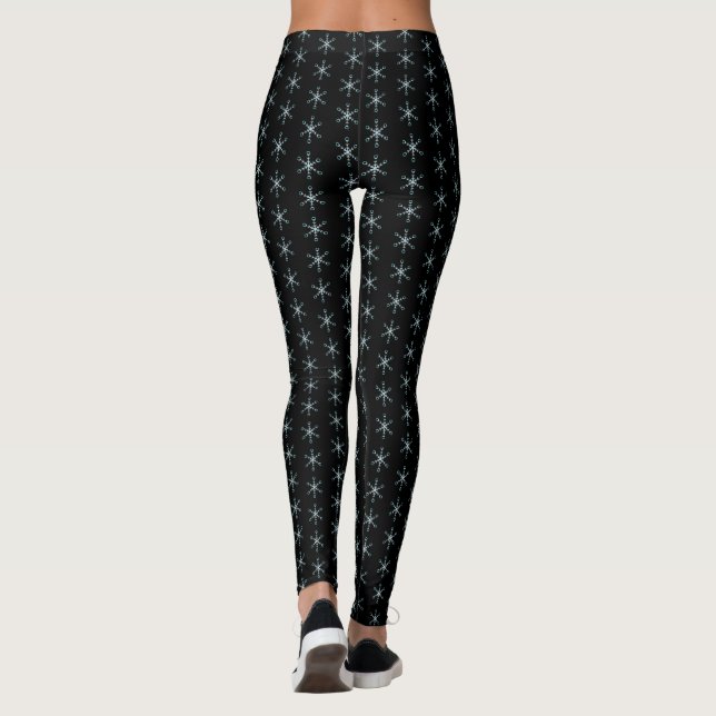 Lichtblaues Schneeflockenmuster auf schwarz Leggings (Rückseite)