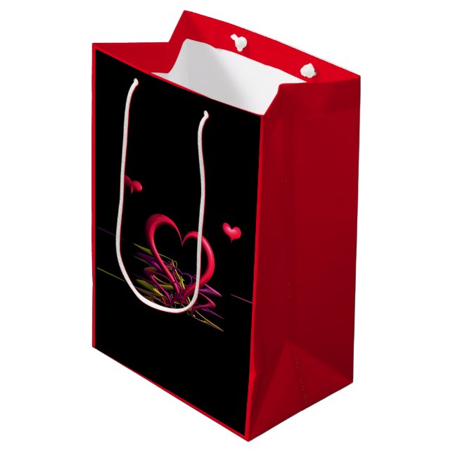 Liebe in der Dunkelheit-Geschenktasche Mittlere Geschenktüte (Vorderseite Schrägansicht)