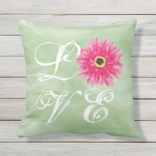 LIEBE Typografie Pink Gerbera Daisy Blume auf Gree Kissen