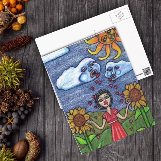 Liebe wird dich wachsen lassen postkarte (Clouds raining red hearts down on lady in sunflowers with orange sun looking on postcard.)