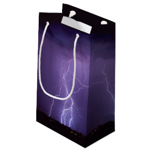 Lila Blitz in einem Nachtwüsten-Gewitter Kleine Geschenktüte