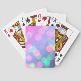 Lila Bokeh-Lichter, die Karten spielen Spielkarten