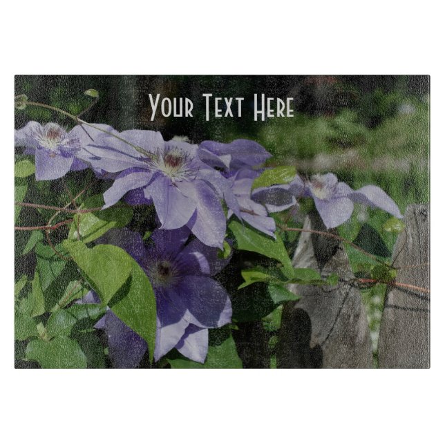 Lila Clematis-Blume zur Zaunnatur Schneidebrett (Vorderseite)