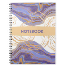 lila, goldenes und weißes Notebook