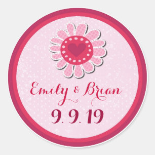 Lila Hochzeitstickeretiketten mit Blume in rosa. Runder Aufkleber