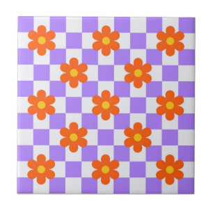 Lila Karo Muster mit orangefarbener Blume Fliese