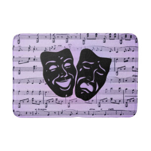 Lila Musik- und Theatermasken Badematte