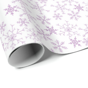 Lila Schneeflockenmuster auf weißem Weihnachten Wi Geschenkpapier