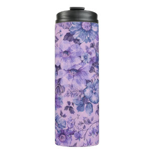 Lila und rosa Blumen auf lila Hintergrund Thermosbecher