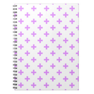 Lilac polka kreuzt auf weiß notizblock