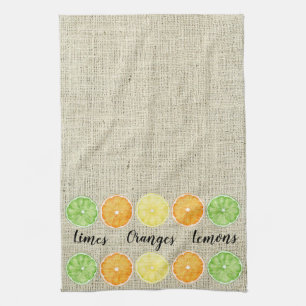 Limes Orangen und Zitronen auf Linen Hintergrund Geschirrtuch